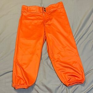 Never worn girls size 26 softball pants - orange